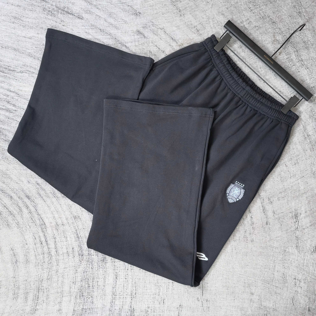 Balenciaga black pants on hangers, elastic waistband, wide legs, crest logo