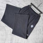 Balenciaga black pants on hangers, elastic waistband, wide legs, crest logo
