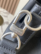 Louis Vuitton black leather handbag with silver key ring hardware and lock
