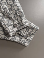 Logo-print sleeve cuff with two metal snap buttons and stitched flap