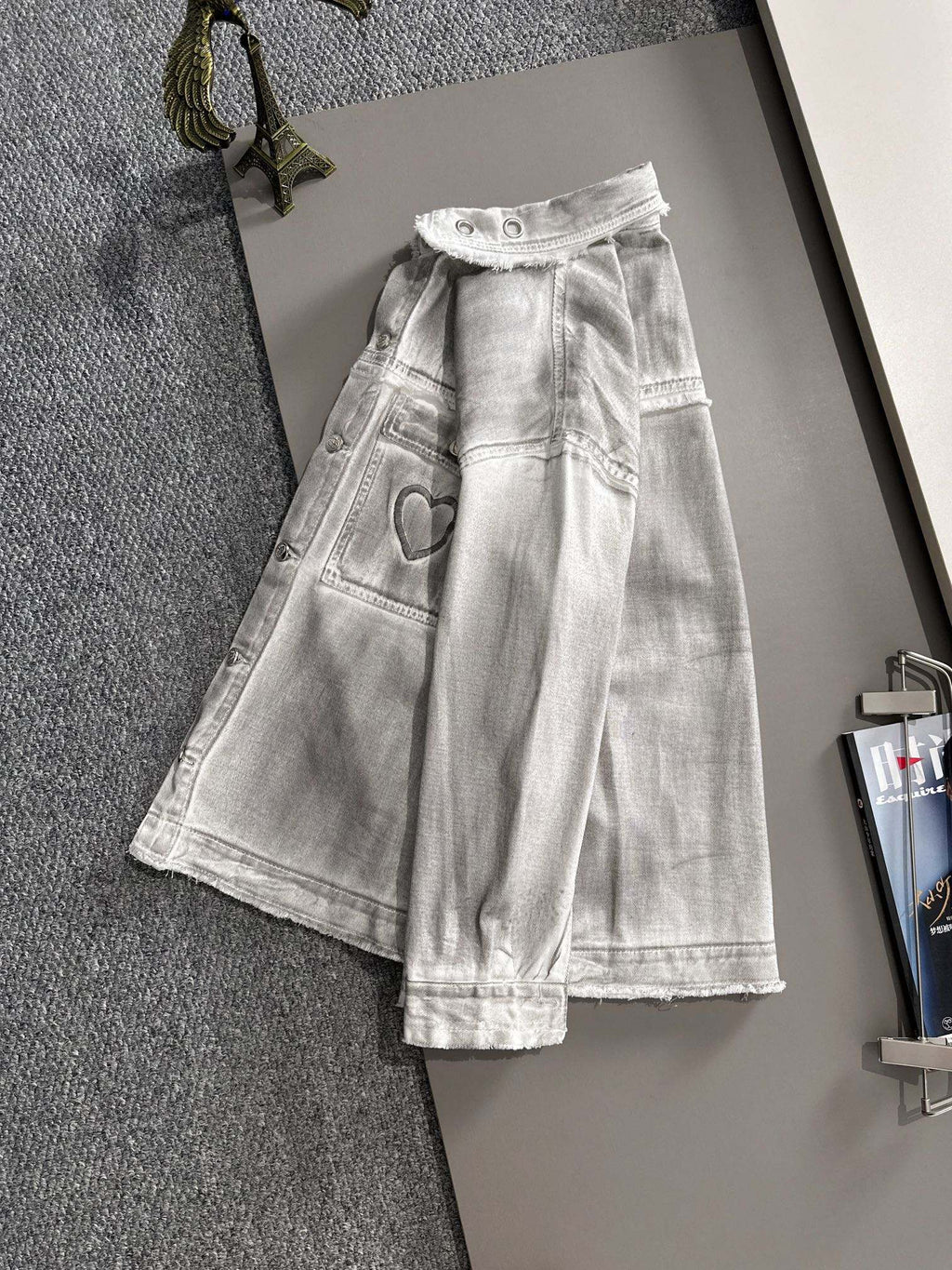 Light denim long dress with gathered waist, front pockets, and heart patch accents