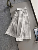 Light denim long dress with gathered waist, front pockets, and heart patch accents
