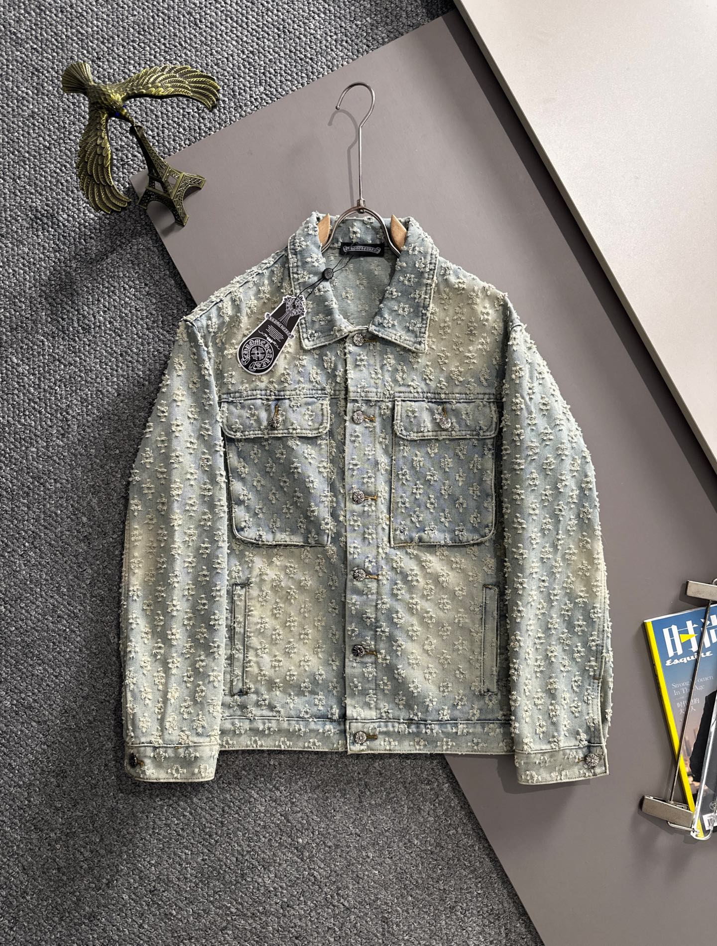 Light blue denim jacket with floral embroidery, button front, flap chest pockets