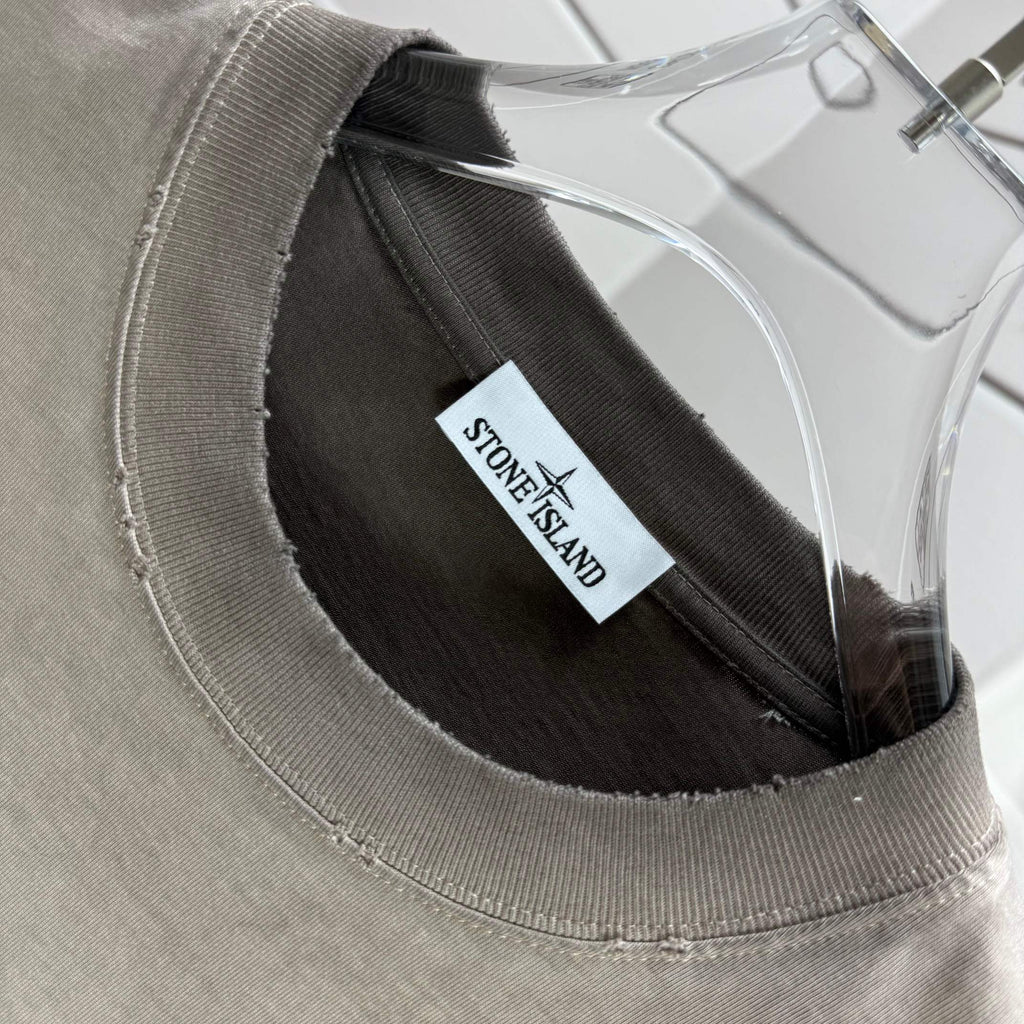 Gray crewneck T-shirt with black inner collar and brand label