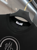 Black T-shirt neckline with inner neck label