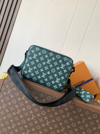 Louis Vuitton teal monogram crossbody bag with black strap and zip closure
