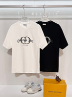White and black Dior crew-neck T-shirts with embroidered oval 'Couture' logo
