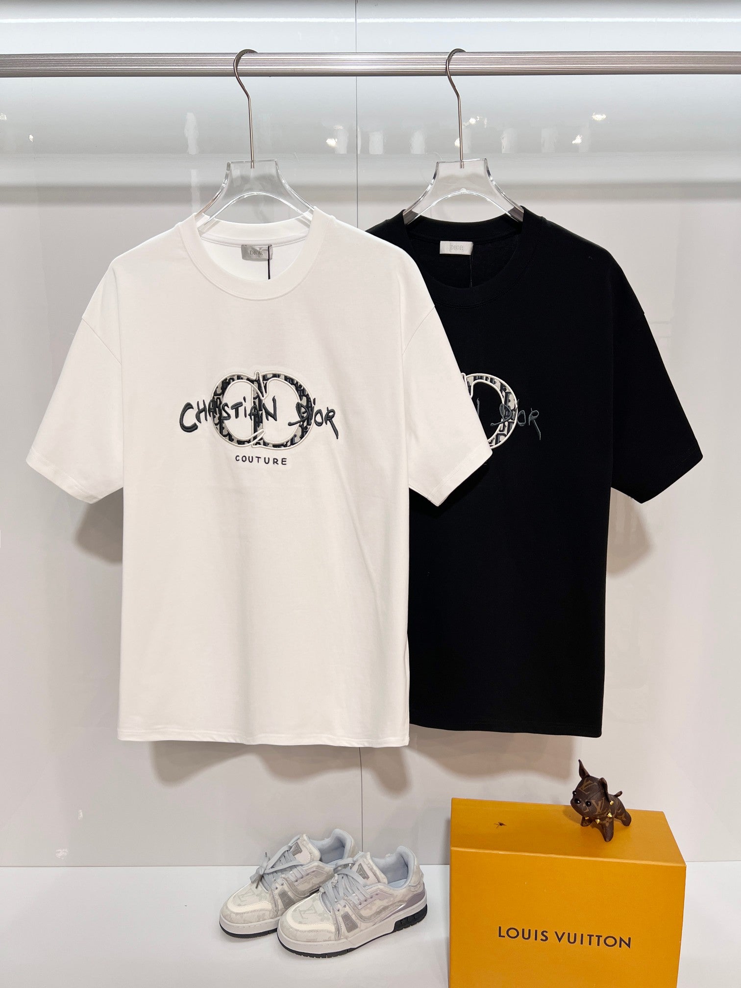 White and black Dior crew-neck T-shirts with embroidered oval 'Couture' logo