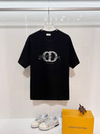 Black Dior crew-neck T-shirt with front embroidered oval logo and 'Couture' text