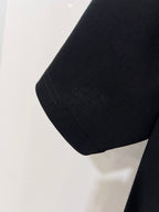 Black Dior T-shirt sleeve hem detail