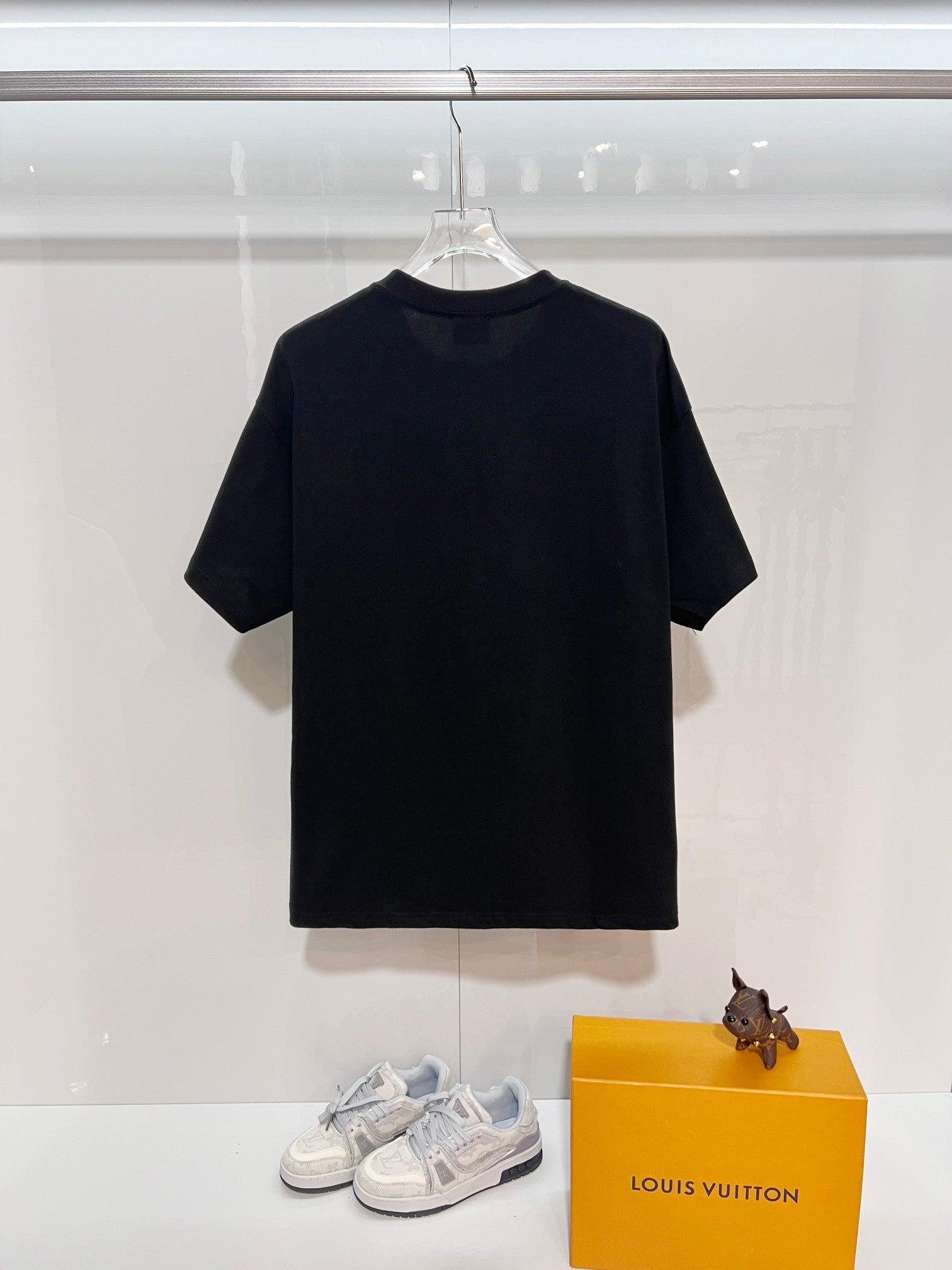 Black short-sleeve T-shirt, back view with crew neck