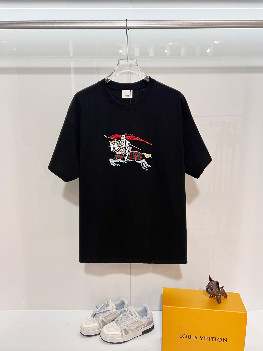 Black short-sleeve T-shirt with horse graphic at center