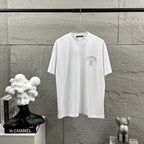 White Louis Vuitton T-shirt with small rhinestone LV logo on front, crew neck