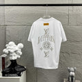 White Louis Vuitton T-shirt with rhinestone LV, globe, and star detailing on back