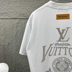 Back of white Louis Vuitton T-shirt with rhinestone LV and globe emblem detail