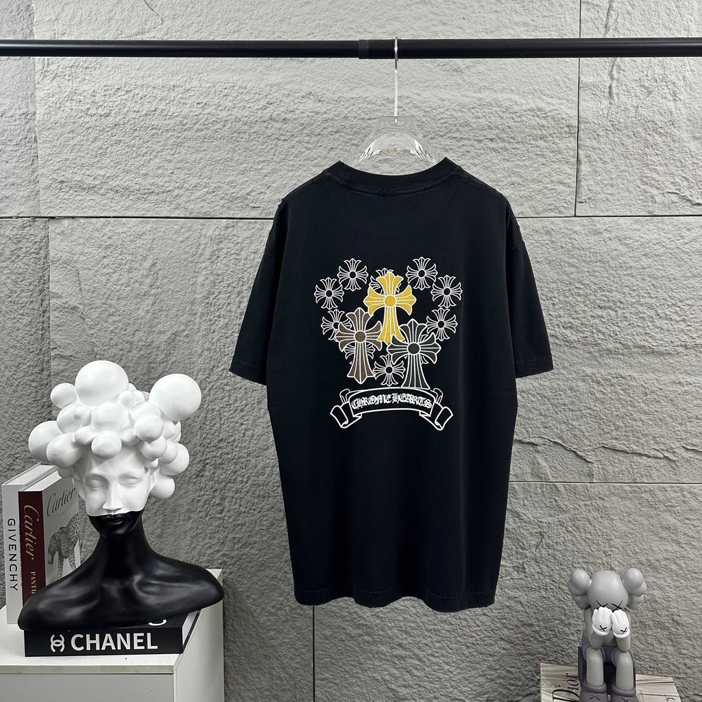 Dark T-shirt with large cross-flower graphic and banner print