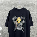 Dark T-shirt showing large cross-flower graphic with ribbon banner