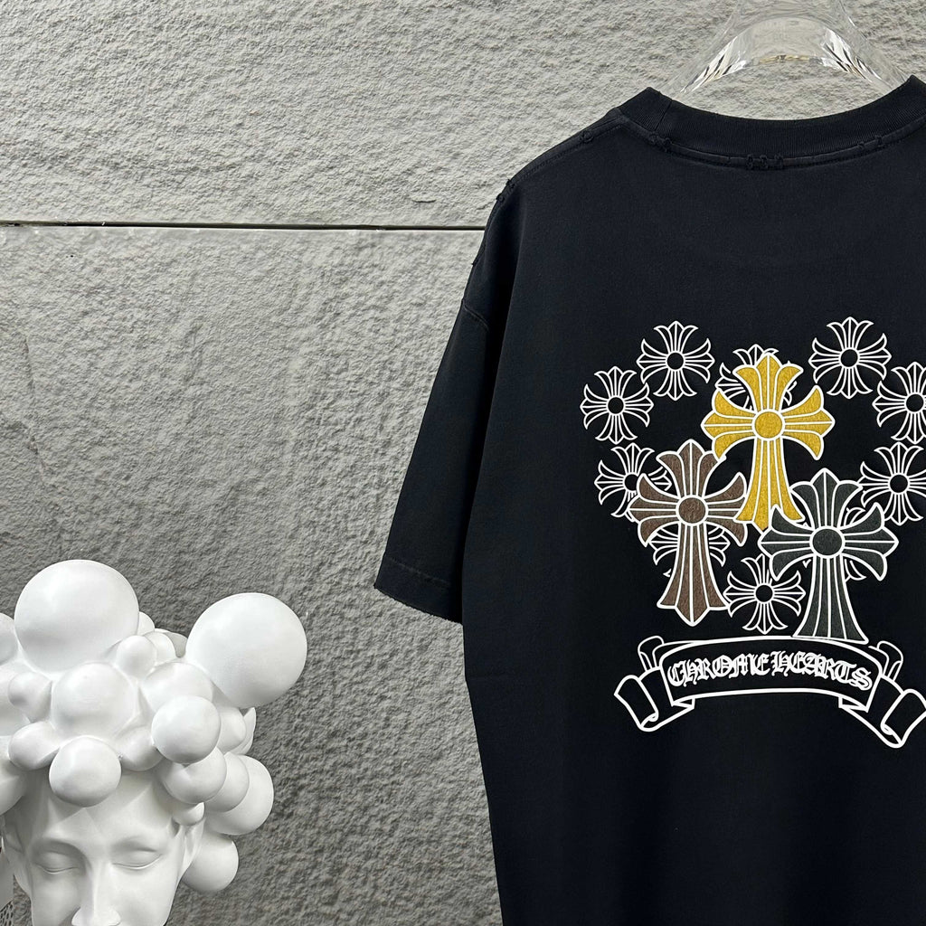 Dark T-shirt back view with cross-flower wreath and ribbon banner