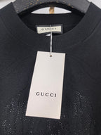 Gucci long-sleeve sweater with hanging white size tag and ribbed collar