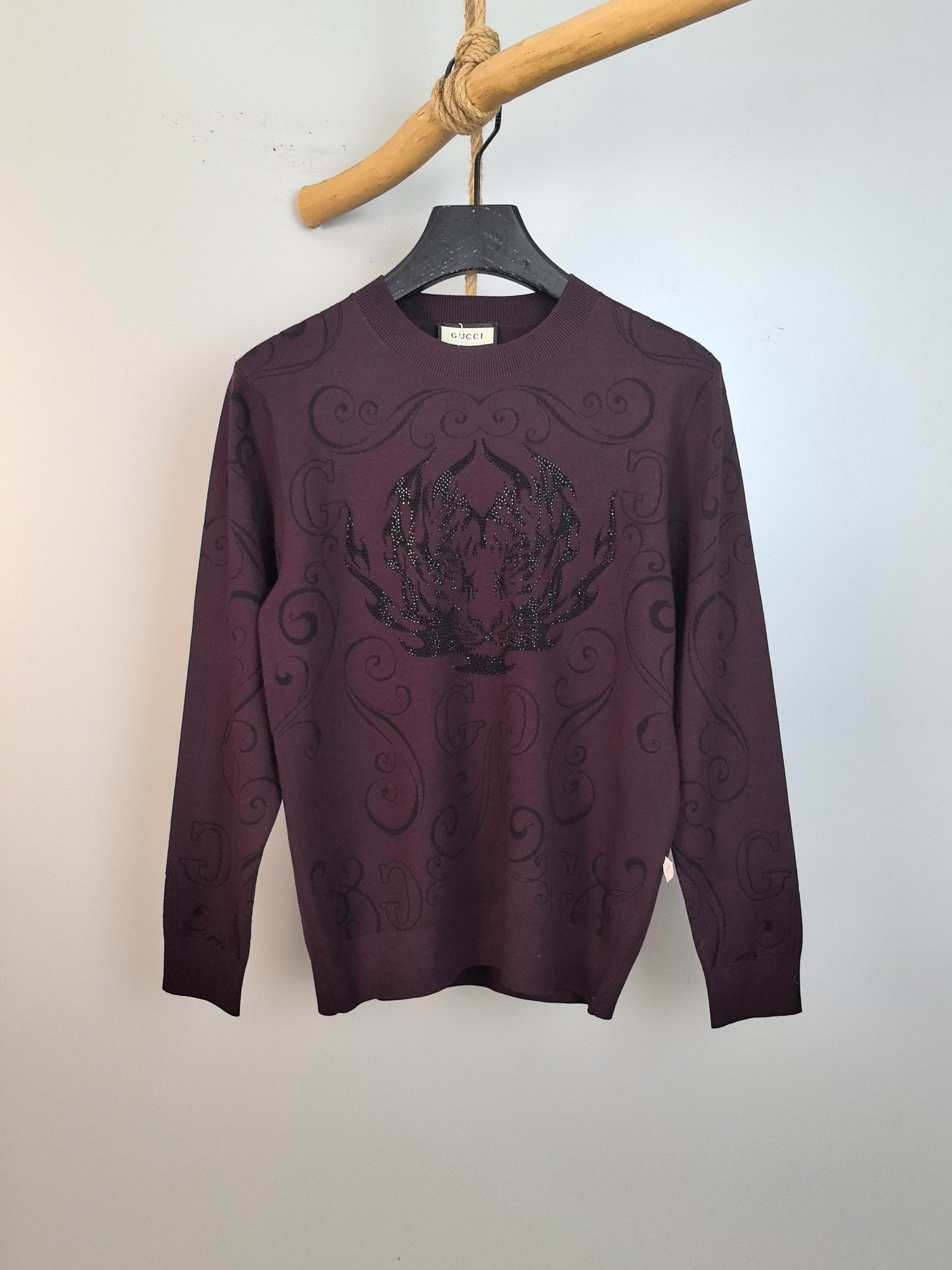 Gucci long-sleeve crewneck sweater in dark plum with ornate front graphic and shimmer trim