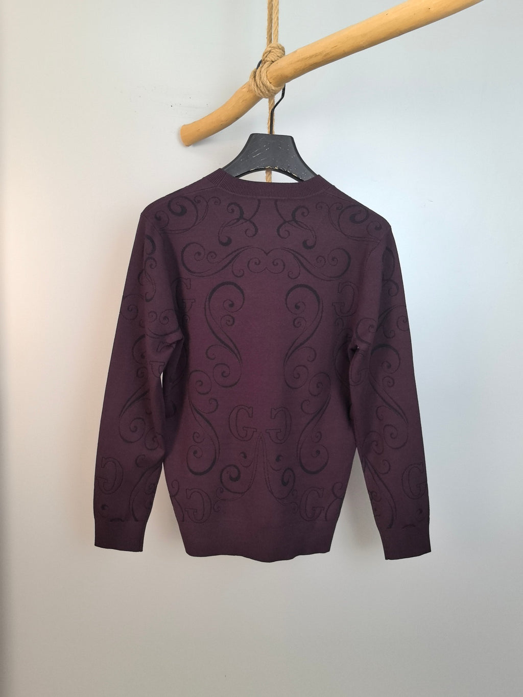 Gucci long-sleeve crewneck sweater back view in dark plum with scrolling pattern