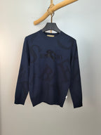 Burberry long-sleeve sweater in dark navy with allover logo pattern, crew neck.