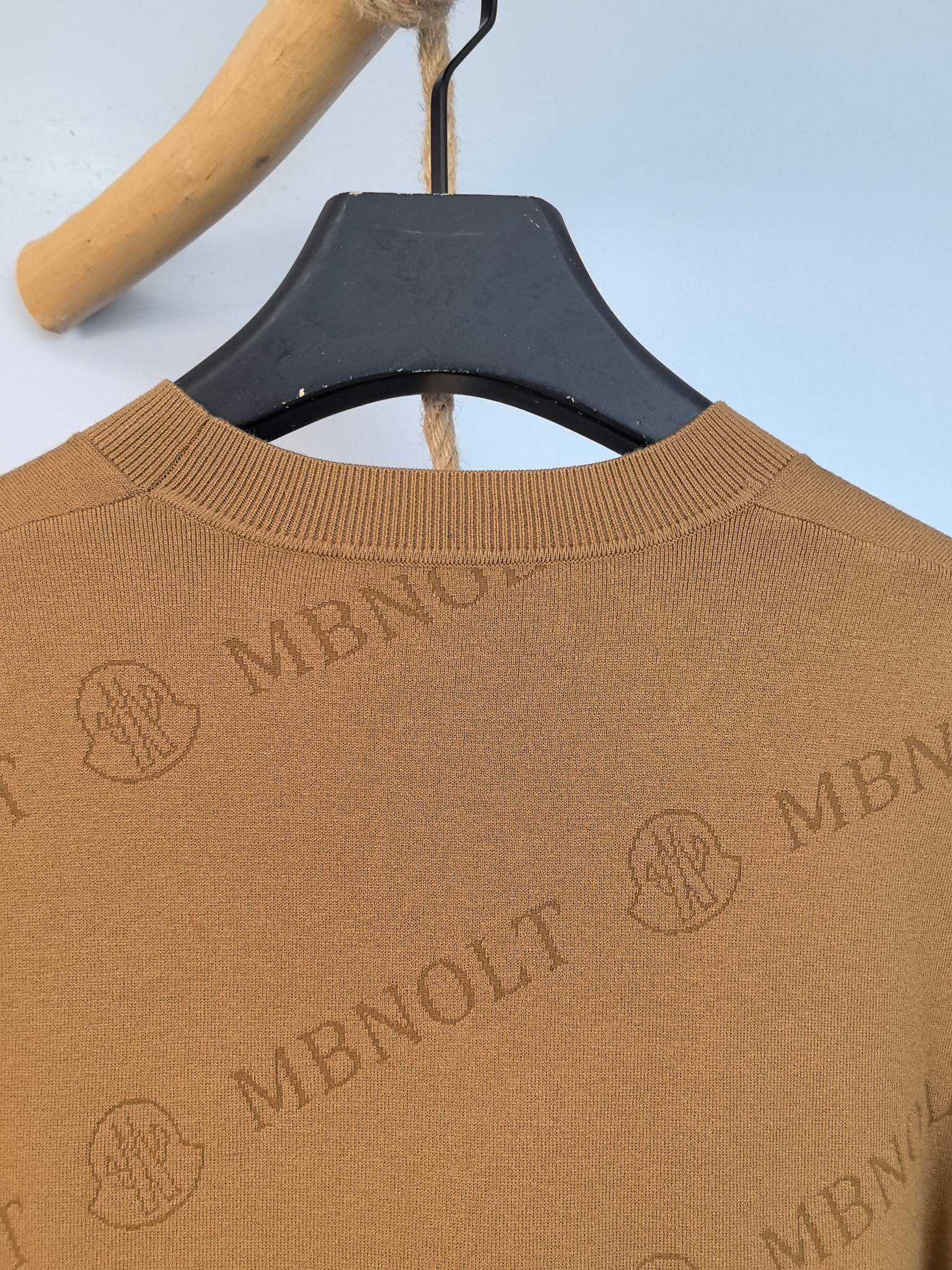 Tan knit sweater back neck and ribbed collar with Moncler logo pattern