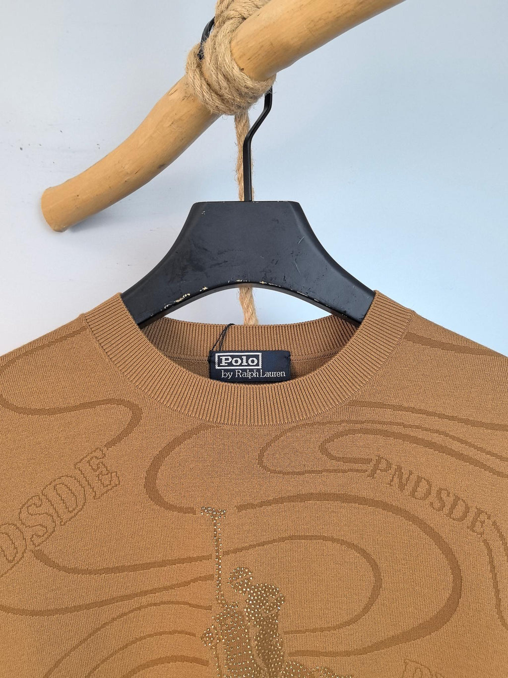 Tan Ralph Lauren sweater with crew neck and glittery polo graphic on front