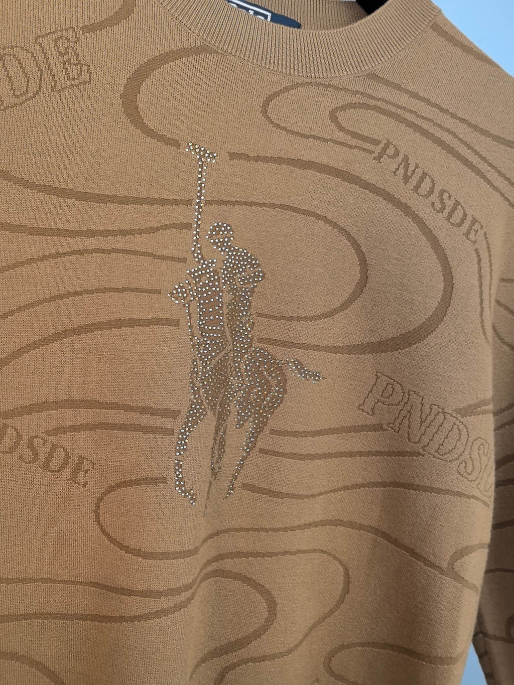 Tan Ralph Lauren sweater front with glittery rhinestone logo graphic