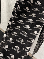 Balenciaga logo-print pants fabric, side seam and cuff detail