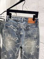 Light blue denim pants with front pockets and scattered white Louis Vuitton monogram
