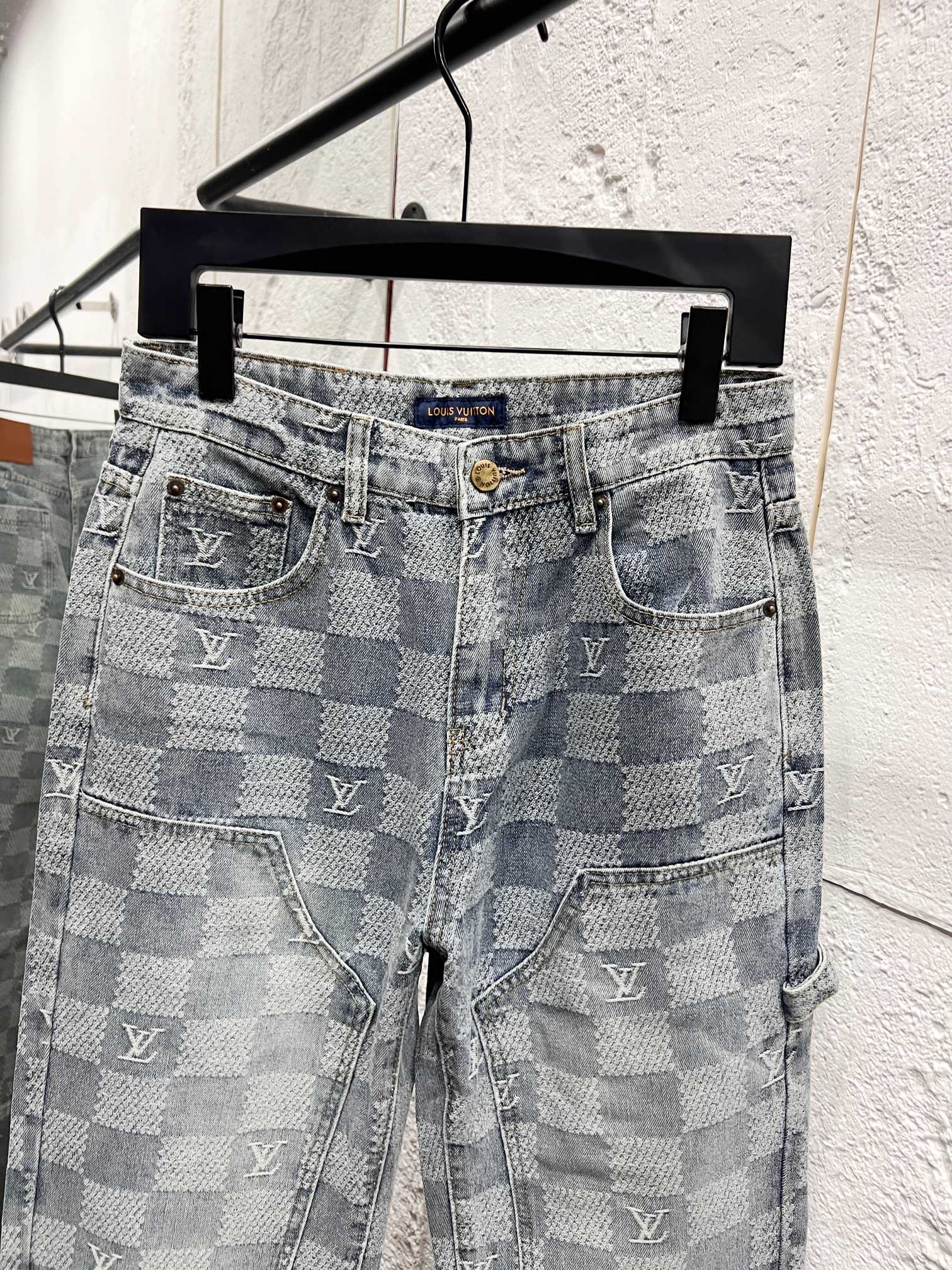 Louis Vuitton monogram jeans full front view with two front pockets and belt loops