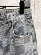 Louis Vuitton monogram jeans front close-up with patch pocket and belt loops