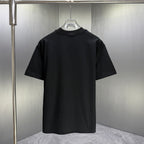 Black Gucci short-sleeve T-shirt with plain back, hanging on a store display hook