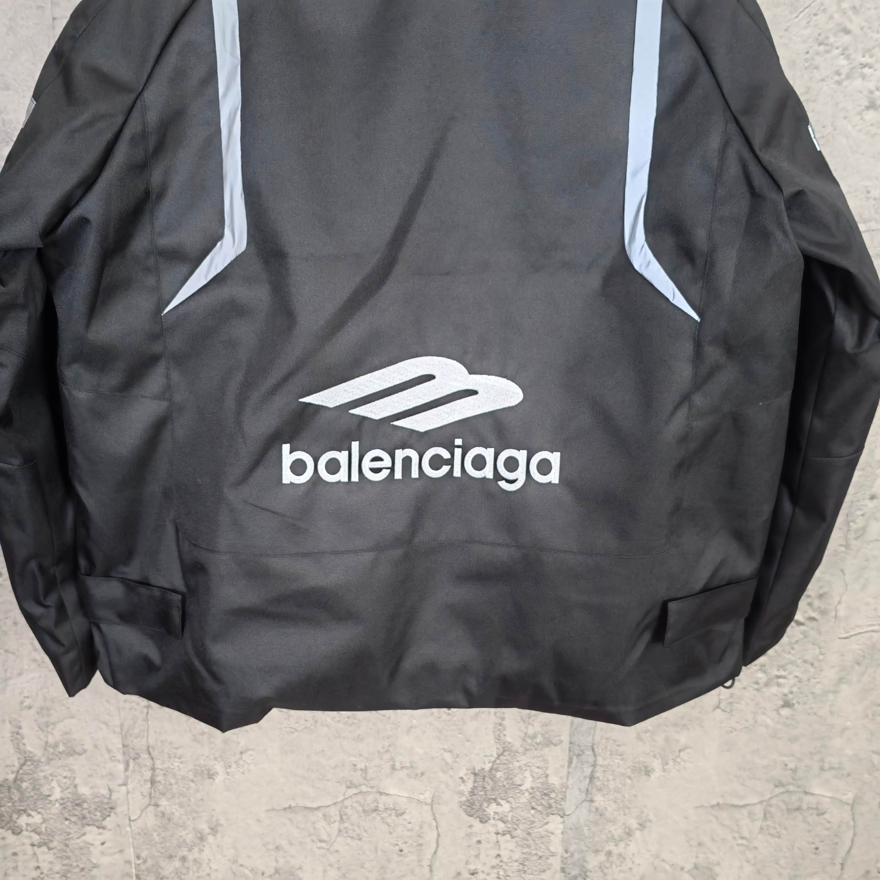 Balenciaga hooded jacket back, dark charcoal with white logo and seam details