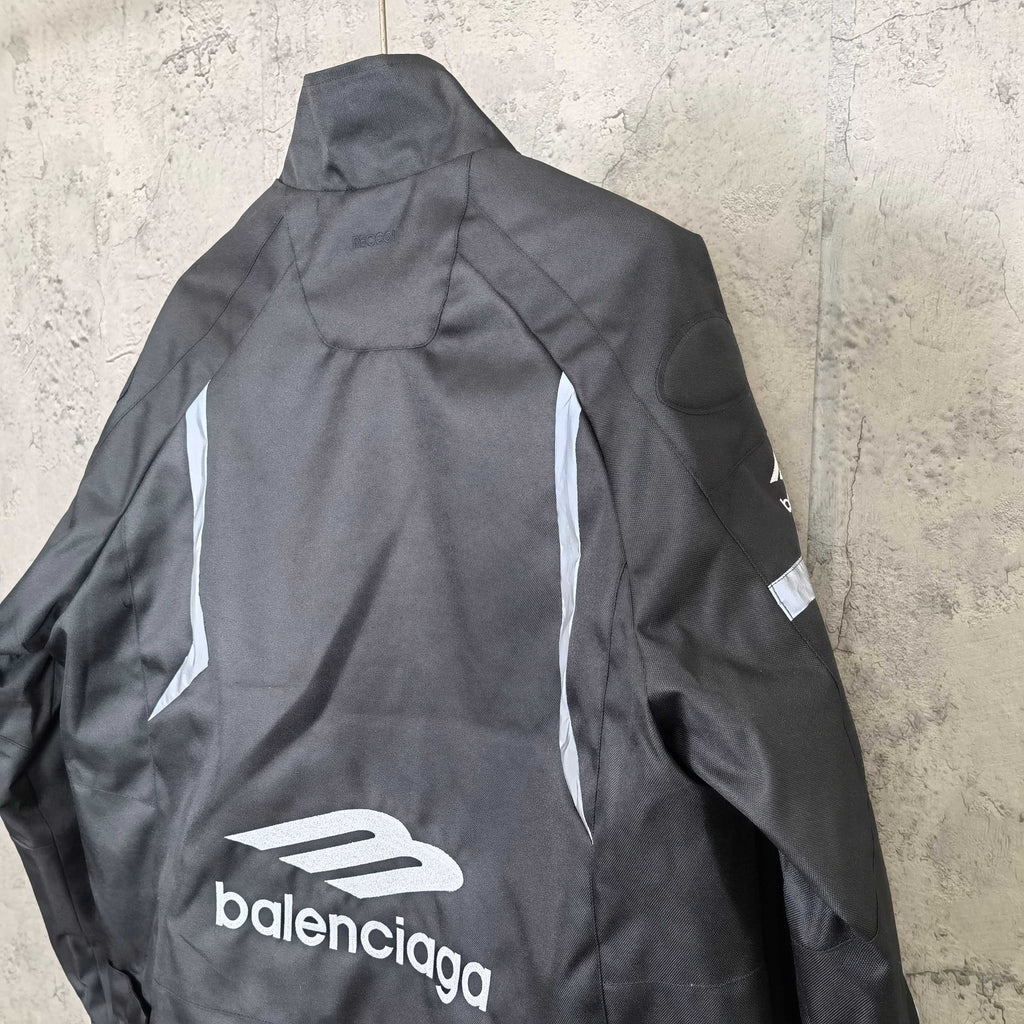 Balenciaga hooded jacket back, dark charcoal with logo and right sleeve pocket