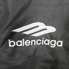 Balenciaga logo print on dark charcoal hooded jacket fabric