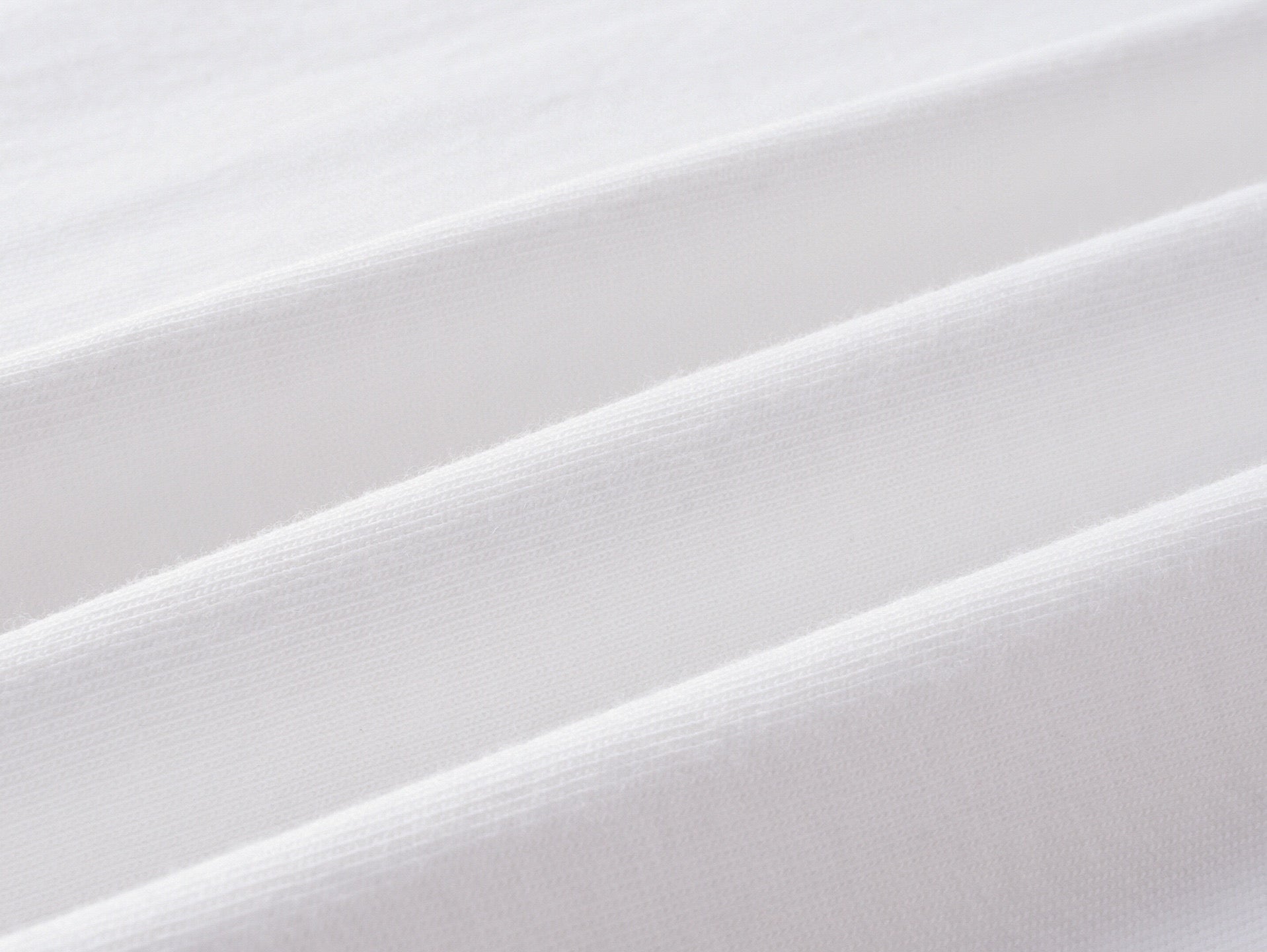 White knit fabric texture for a long-sleeve shirt