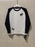 Long-sleeve raglan T-shirt, white with black sleeves and chest cross graphic