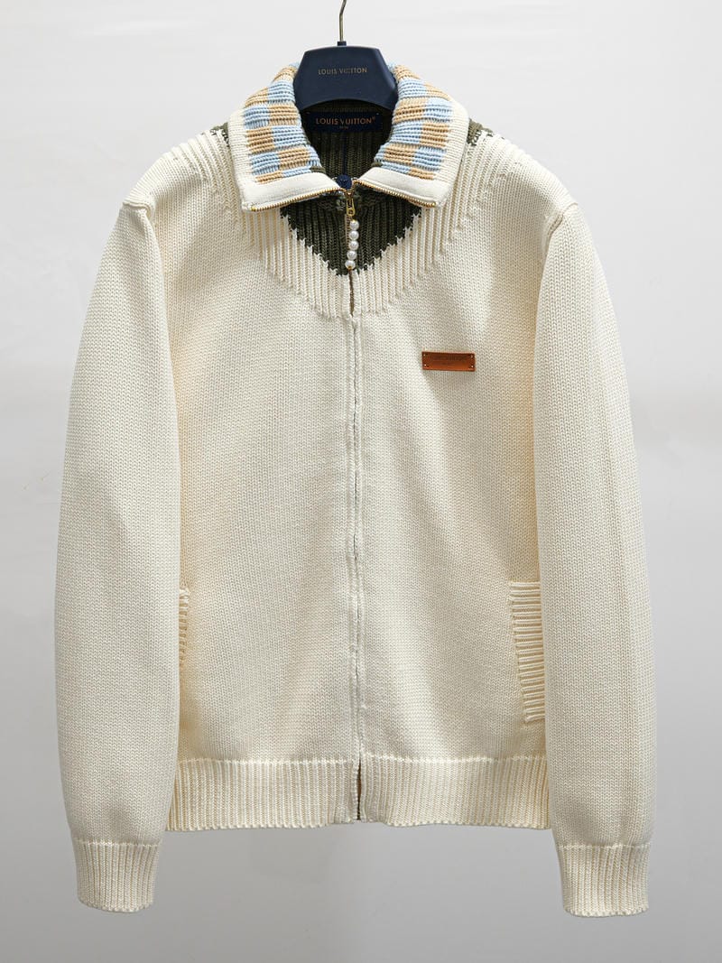 Ivory knit zip-up jacket with striped ribbed collar and pearl-button placket