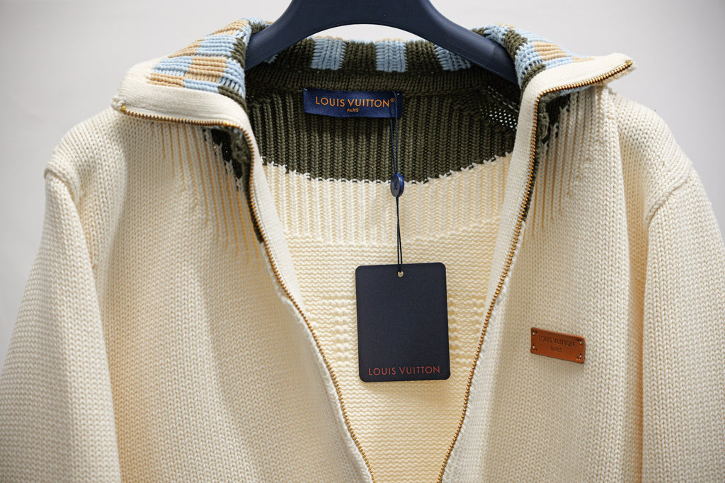 Ivory knit zip-up jacket with Louis Vuitton hang tag and inner neckline trim