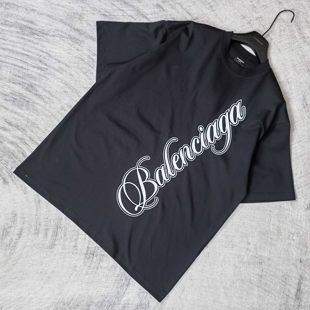 Balenciaga black short-sleeve T-shirt with white Balenciaga script logo