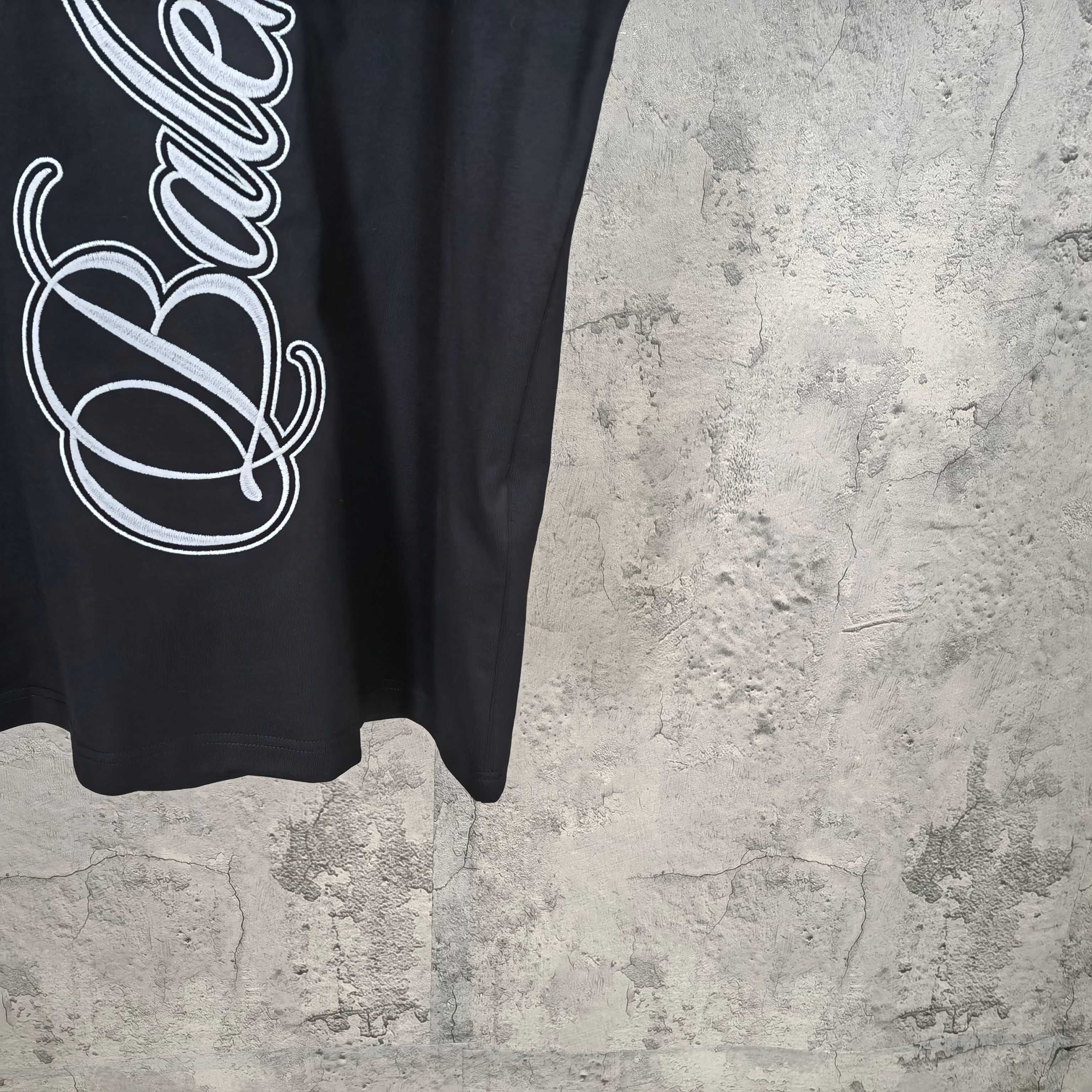 Balenciaga T-shirt hem with large script logo