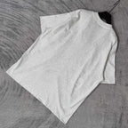 Balenciaga T-shirt, light gray, crew neck, short sleeves, plain back, folded.