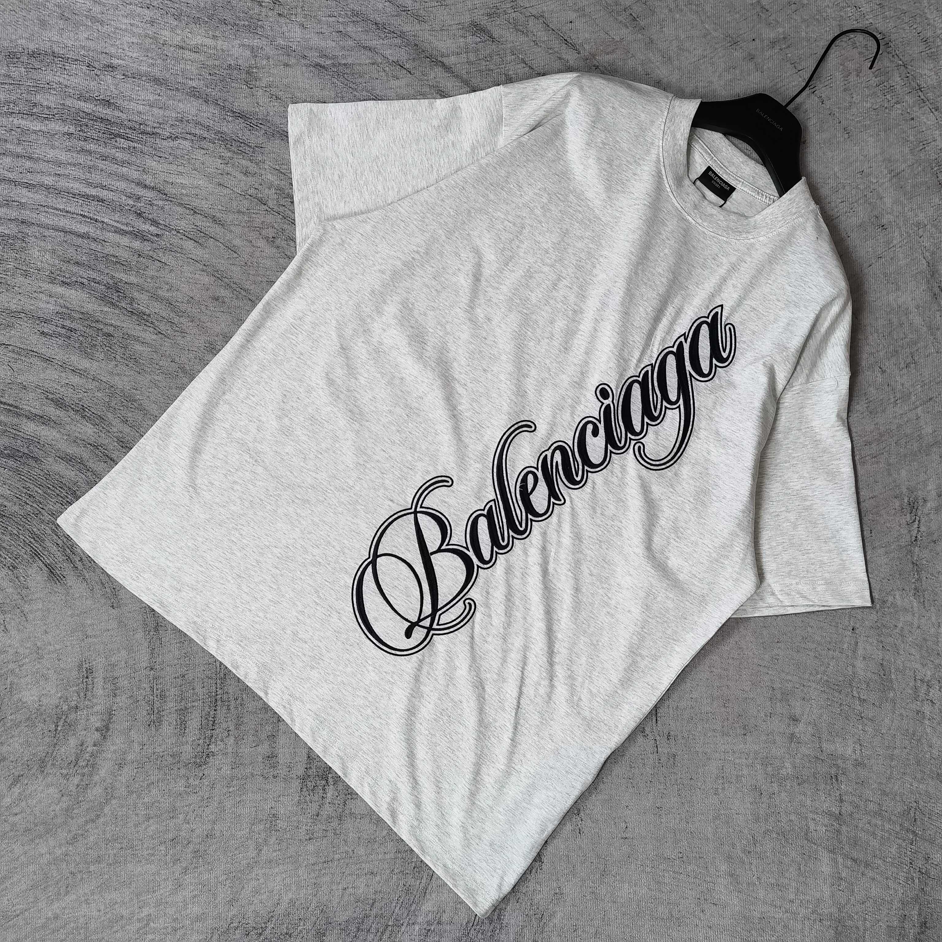 Balenciaga logo T-shirt in light gray with black script graphic on front