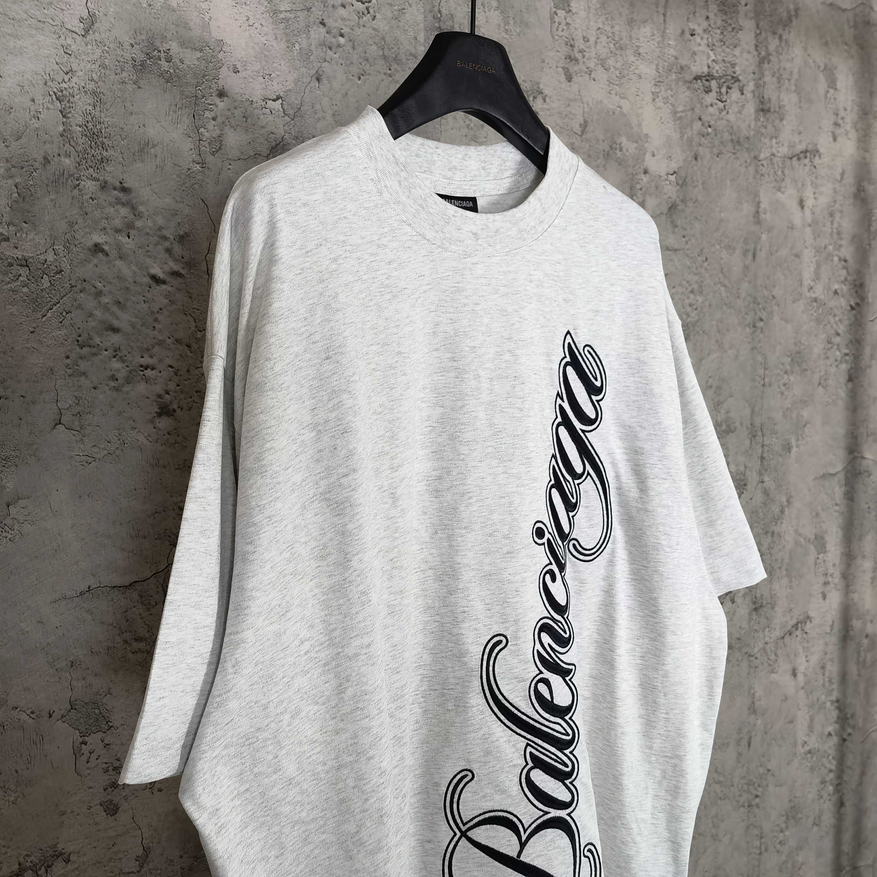 Balenciaga logo T-shirt in light gray with black script graphic on front