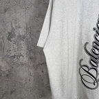 Balenciaga T-shirt, light gray, black script logo print detail on chest.