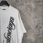Balenciaga light gray short-sleeve T-shirt with large black script logo