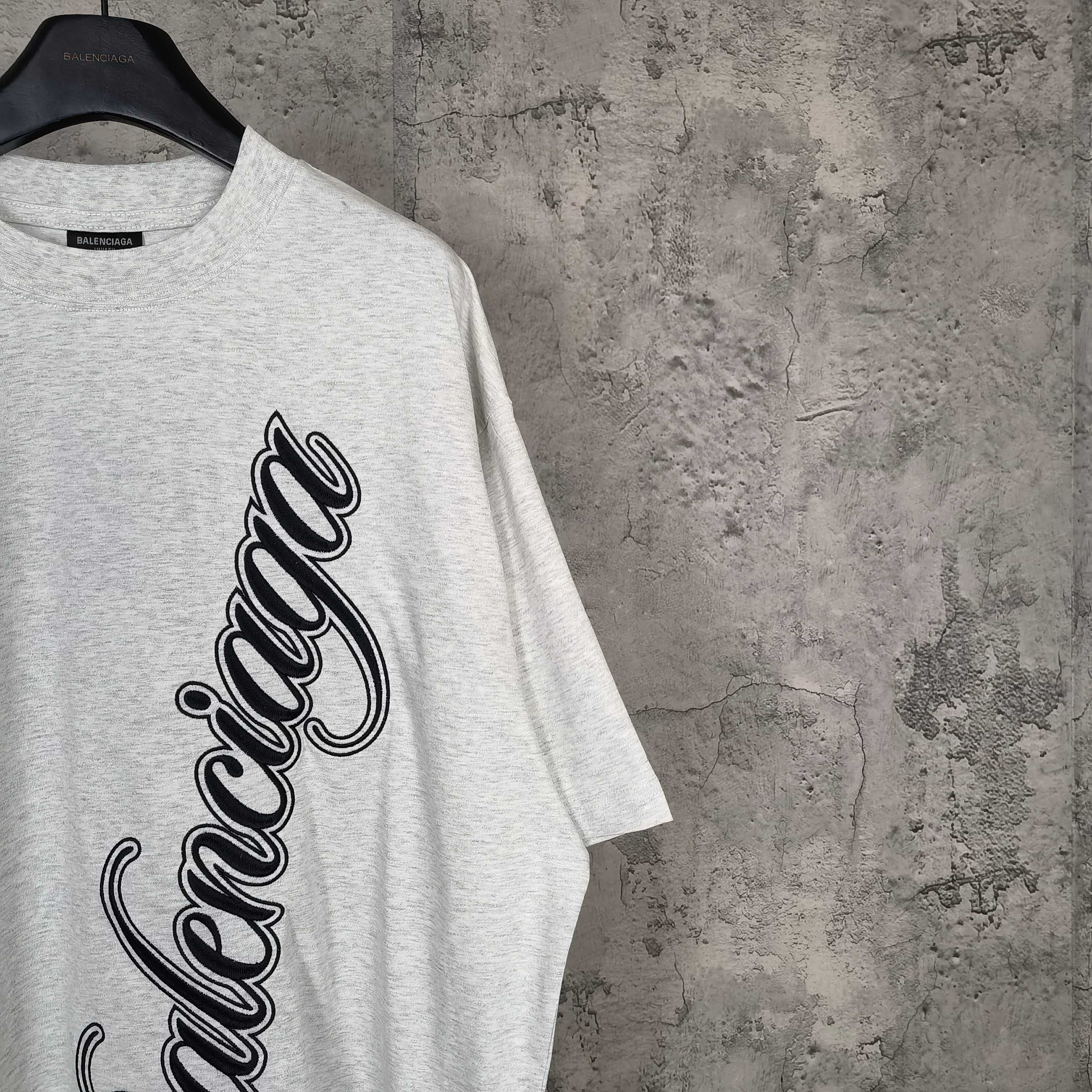 Balenciaga light gray short-sleeve T-shirt with large black script logo