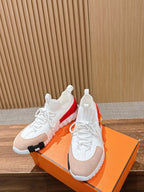 Hermes unisex sneakers, white knit with red heel stripe and black rubber side detail